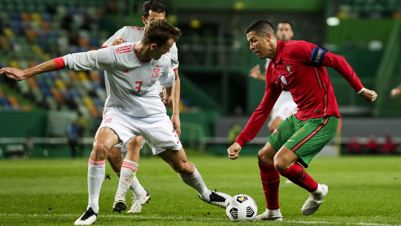 LISBON, PORTUGAL - OCTOBER 7: (L-R) Diego Llorente of Spain, Cristiano Ronaldo of Portugal during the International Friendly match between Portugal v Spain at the Jose Alvalade stadium on October 7, 2020 in Lisbon Portugal