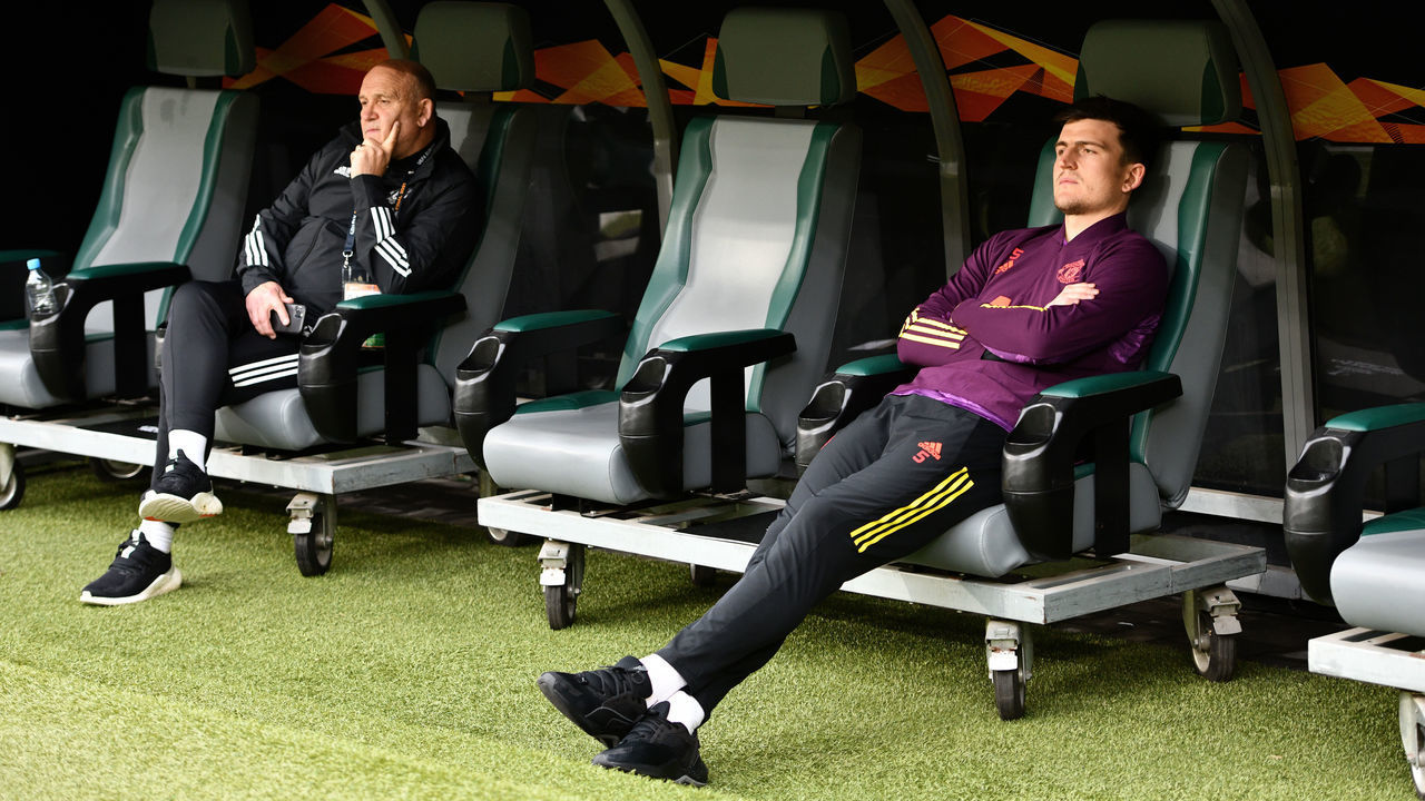 GDANSK, POLAND - MAY 25: Harry Maguire of Manchester United watches from the bench during the Manchester United Training Session ahead of the UEFA Europa League Final between Villarreal CF and Manchester United at Gdansk Arena on May 25, 2021 in Gdansk, Poland.