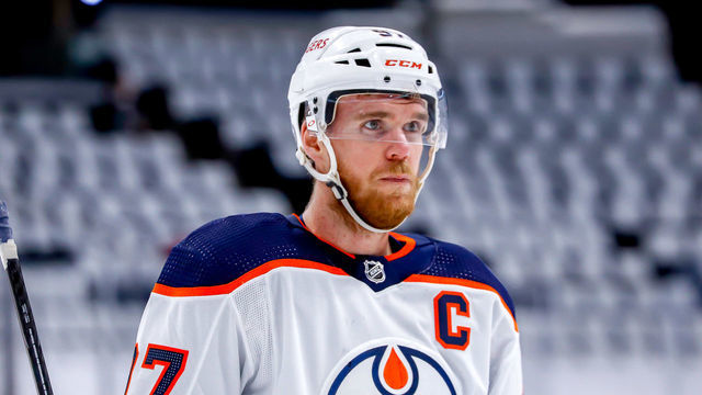 WINNIPEG, MB - MAY 23: Connor McDavid #97 of the Edmonton Oilers looks on during a first period stoppage in play against the Winnipeg Jets in Game Three of the First Round of the 2021 Stanley Cup Playoffs at the Bell MTS Place on May 23, 2021 in Winnipeg, Manitoba, Canada.