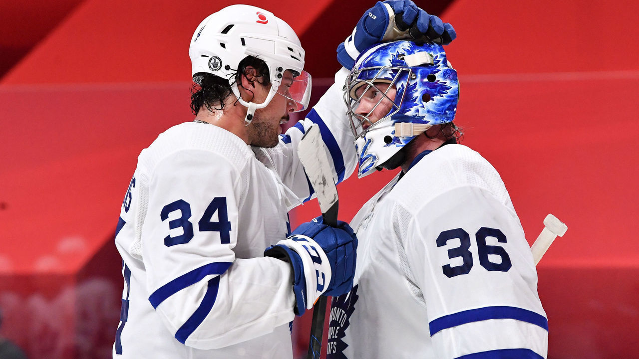 MONTREAL, QC - MAY 24: Auston Matthews #34 of the Toronto Maple Leafs celebrates with goalie Jack Campbell #36 after defeating the Montreal Canadiens in Game Three of the First Round of the 2021 Stanley Cup Playoffs at the Bell Centre on May 24, 2021 in Montreal, Quebec, Canada.