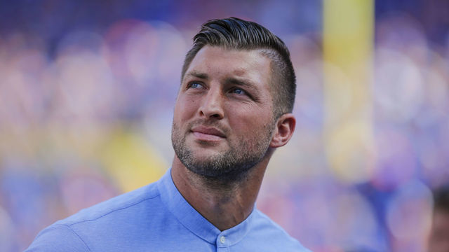 GAINESVILLE, FL - OCTOBER 06: Former Florida Gators great Tim Tebow looks on during the game between the LSU Tigers and the Florida Gators on October 6, 2018 at Ben Hill Griffin Stadium at Florida Field in Gainesville, Fl.