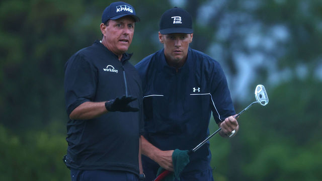 HOBE SOUND, FLORIDA - MAY 24: Phil Mickelson reads a putt for NFL player Tom Brady of the Tampa Bay Buccaneers on the 17th green during The Match: Champions For Charity at Medalist Golf Club on May 24, 2020 in Hobe Sound, Florida.