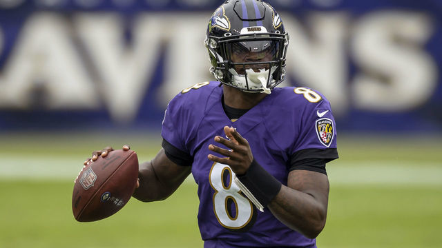 BALTIMORE, MD - OCTOBER 11: Lamar Jackson #8 of the Baltimore Ravens looks to pass against the Cincinnati Bengals during the first half at M&T Bank Stadium on October 11, 2020 in Baltimore, Maryland.