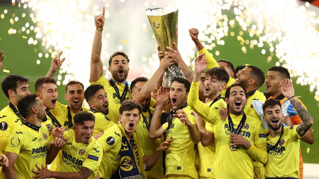 Villarreal's players lift the trophy after winning the UEFA Europa League final football match between Villarreal CF and Manchester United at the Gdansk Stadium in Gdansk on May 26, 2021.