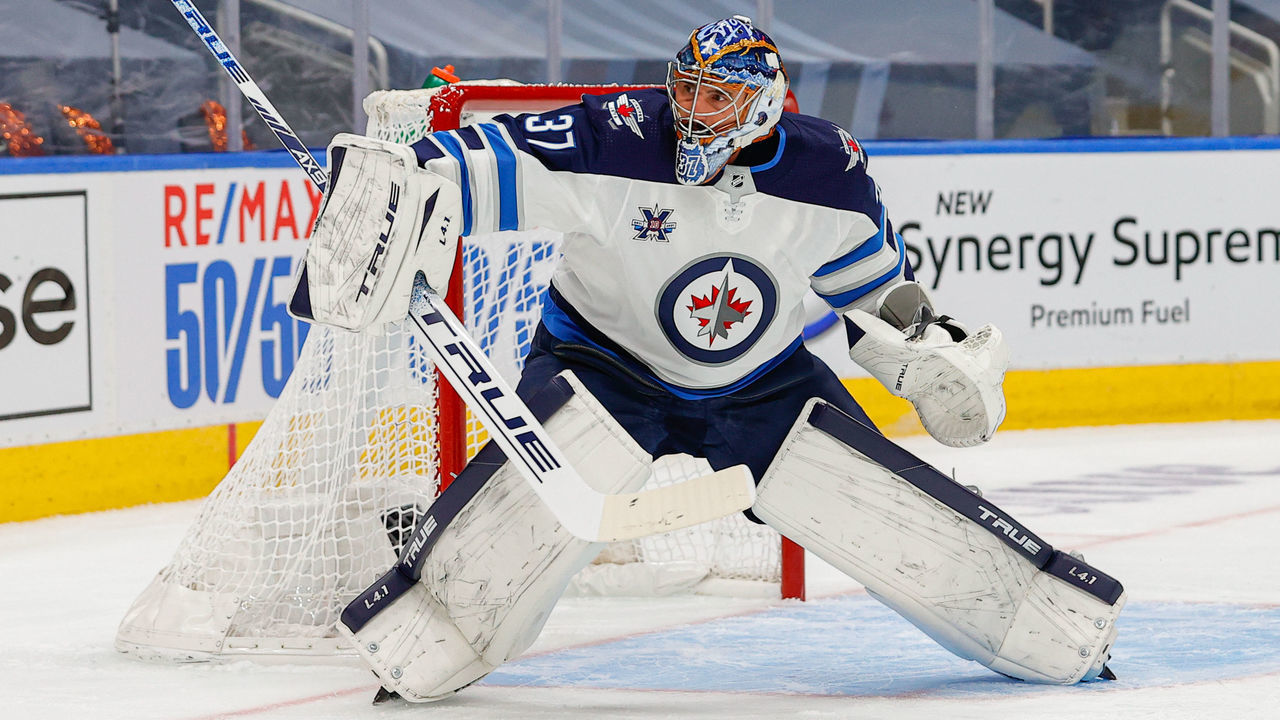 EDMONTON, AB - MAY 19: Winnipeg Jets Goalie Connor Hellebuyck (37) makes a save in the first period during First Round of the Stanley Cup Playoffs between the Edmonton Oilers versus the Winnipeg Jets on MAY 19, 2021 at Rogers Place in Edmonton, AB.