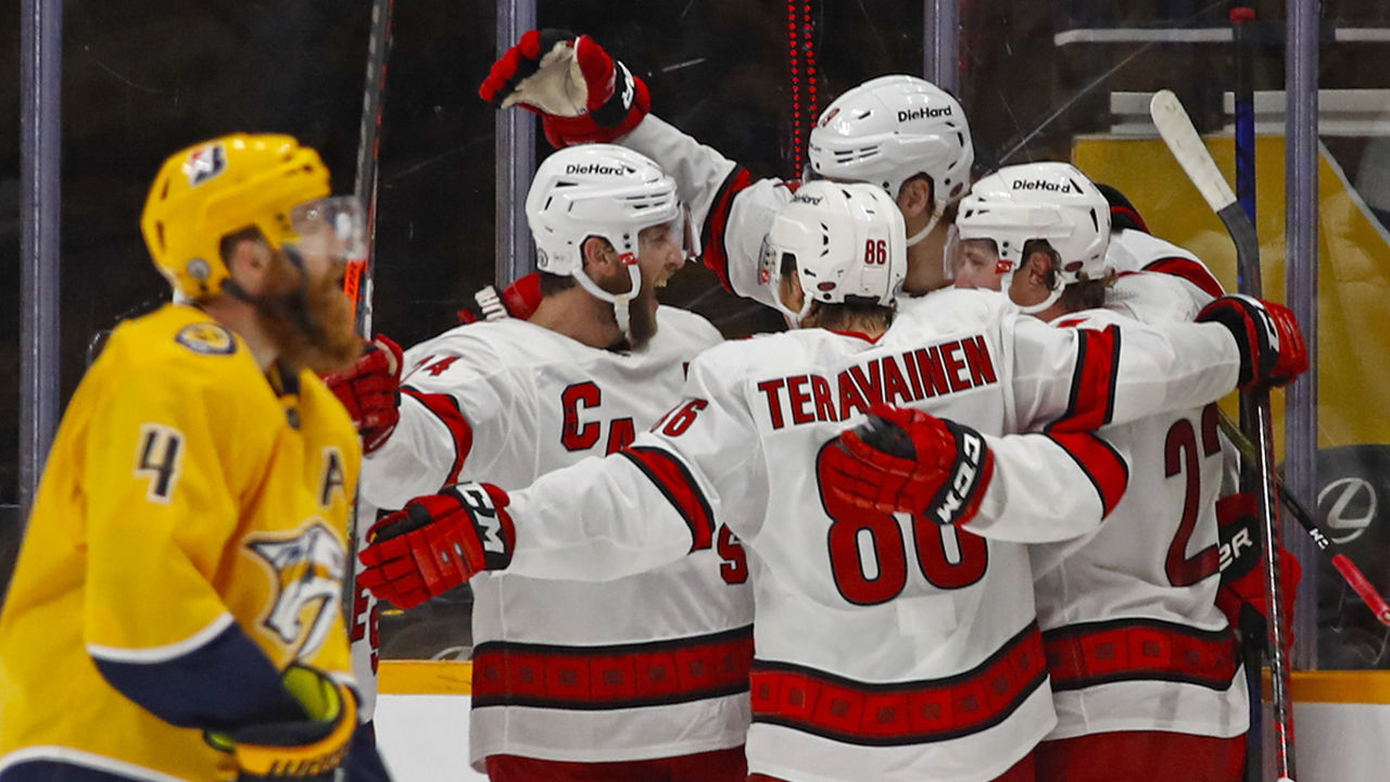 NASHVILLE, TENNESSEE - MAY 27: Teuvo Teravainen #86, Brock McGinn #23, Dougie Hamilton #19, and Jaccob Slavin #74 of the Carolina Hurricanes celebrate after scoring the game tying goal against the Nashville Predators during the third period in Game Six of the First Round of the 2021 Stanley Cup Playoffs at Bridgestone Arena on May 27, 2021 in Nashville, Tennessee.