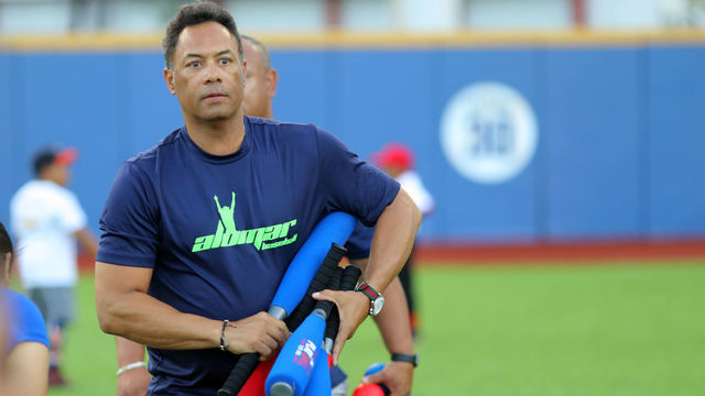 SAN JUAN, PR - APRIL 16: Hall of Famer Roberto Alomar carries bats during the PLAY BALL clinic at Hiram Bithorn Stadium on Monday, April 16, 2018 in San Juan, Puerto Rico.