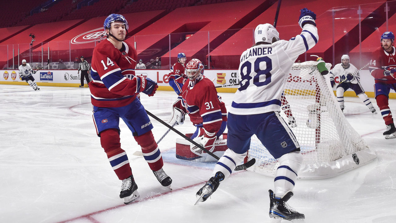 MONTREAL, QC - MAY 25: William Nylander #88 of the Toronto Maple Leafs celebrates his goal while Nick Suzuki #14 of the Montreal Canadiens reacts during the second period in Game Four of the First Round of the 2021 Stanley Cup Playoffs at the Bell Centre on May 25, 2021 in Montreal, Canada.