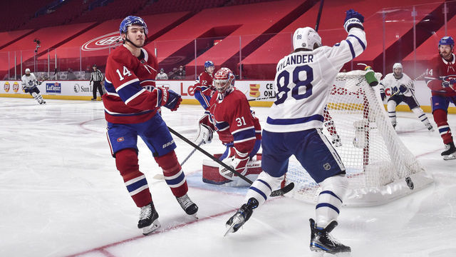 MONTREAL, QC - MAY 25: William Nylander #88 of the Toronto Maple Leafs celebrates his goal while Nick Suzuki #14 of the Montreal Canadiens reacts during the second period in Game Four of the First Round of the 2021 Stanley Cup Playoffs at the Bell Centre on May 25, 2021 in Montreal, Canada.