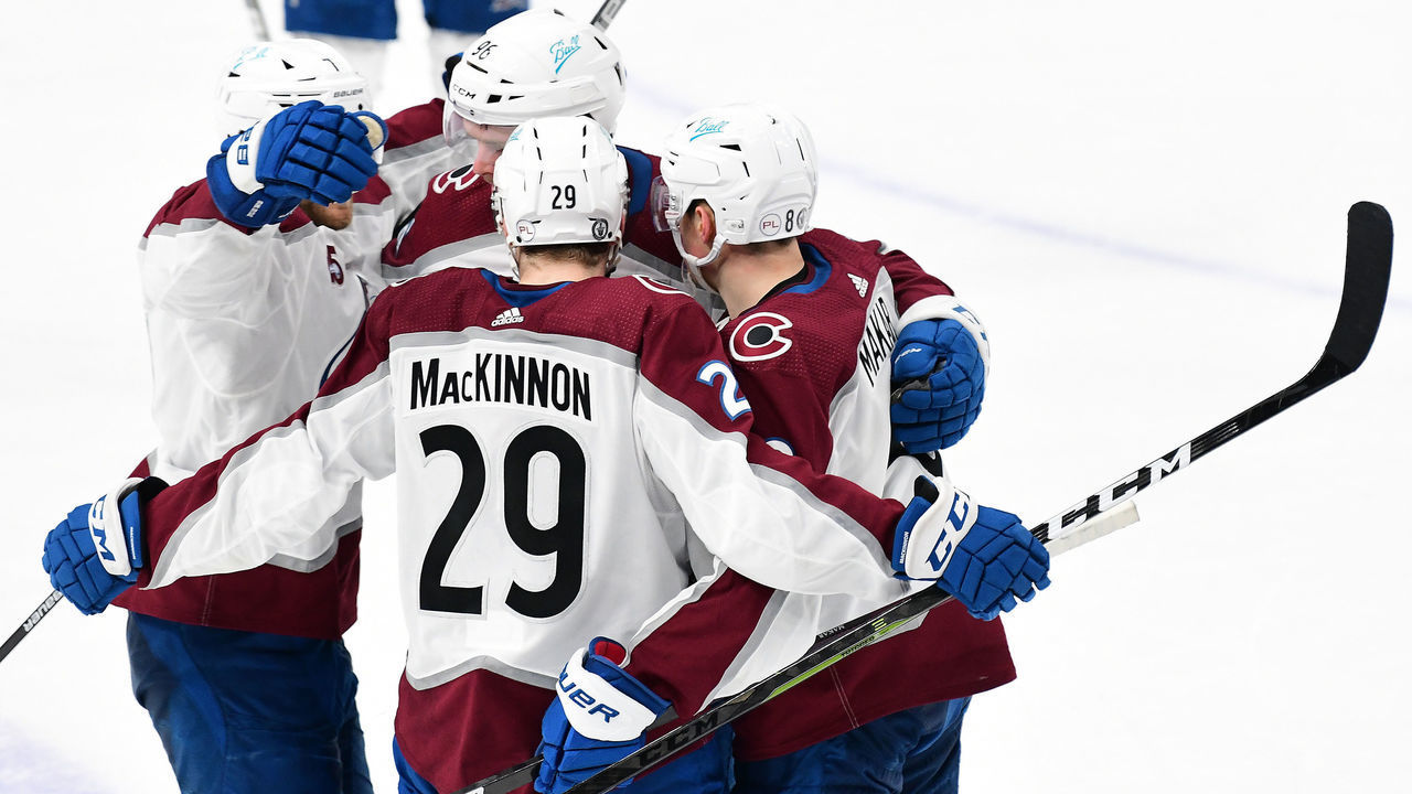 ST. LOUIS, MO - MAY 23: Avalanche players celebrate after Colorado Avalanche centerman Nathan McKinnon (29) scored an empty net goal late in the game during the fourth game of a first round Stanley Cup Playoff series between the Colorado Avalanche and the St. Louis Blues on May 23, 2021, at Enterprise Center, St. Louis, Mo. ,
