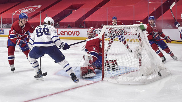 MONTREAL, QC - MAY 25: William Nylander #88 of the Toronto Maple Leafs scores on goaltender Carey Price #31 of the Montreal Canadiens during the second period in Game Four of the First Round of the 2021 Stanley Cup Playoffs at the Bell Centre on May 25, 2021 in Montreal, Canada. The Toronto Maple Leafs defeated the Montreal Canadiens 4-0.