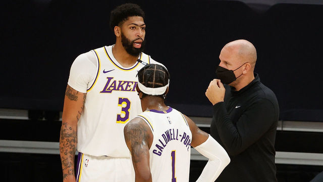 PHOENIX, ARIZONA - MAY 23: Anthony Davis #3 of the Los Angeles Lakers talks with assistant coach Jason Kidd and Kentavious Caldwell-Pope #1 during the second half of Game One of the Western Conference first-round playoff series at Phoenix Suns Arena on May 23, 2021 in Phoenix, Arizona. The Suns defeated the Lakers 99-90.