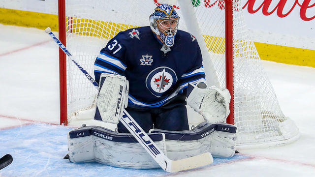 WINNIPEG, MB - MAY 23: Goaltender Connor Hellebuyck #37 of the Winnipeg Jets guards the net during third period action against the Edmonton Oilers in Game Three of the First Round of the 2021 Stanley Cup Playoffs at Bell MTS Place on May 23, 2021 in Winnipeg, Manitoba.