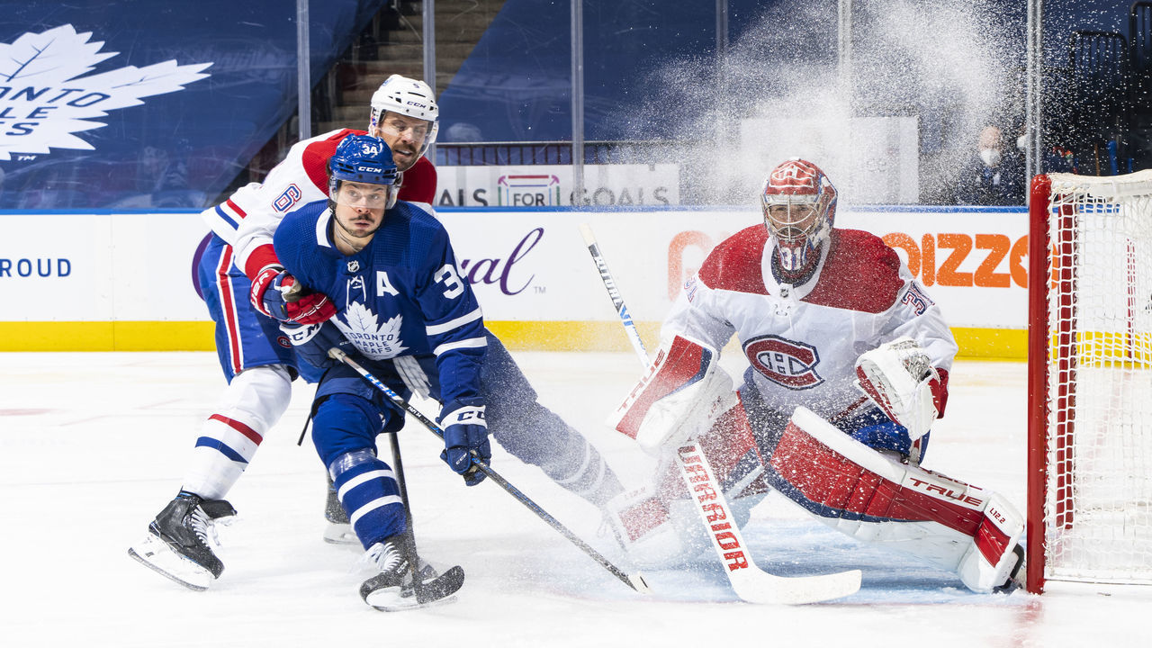 TORONTO, ON - MAY 27: Auston Matthews #34 of the Toronto Maple Leafs goes to the net as Shea Weber #6 of the Montreal Canadiens defends in front of Carey Price #31 during the first period in Game Five of the First Round of the 2021 Stanley Cup Playoffs at the Scotiabank Arena on May 27, 2021 in Toronto, Ontario, Canada.