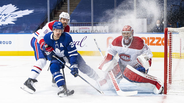 TORONTO, ON - MAY 27: Auston Matthews #34 of the Toronto Maple Leafs goes to the net as Shea Weber #6 of the Montreal Canadiens defends in front of Carey Price #31 during the first period in Game Five of the First Round of the 2021 Stanley Cup Playoffs at the Scotiabank Arena on May 27, 2021 in Toronto, Ontario, Canada.