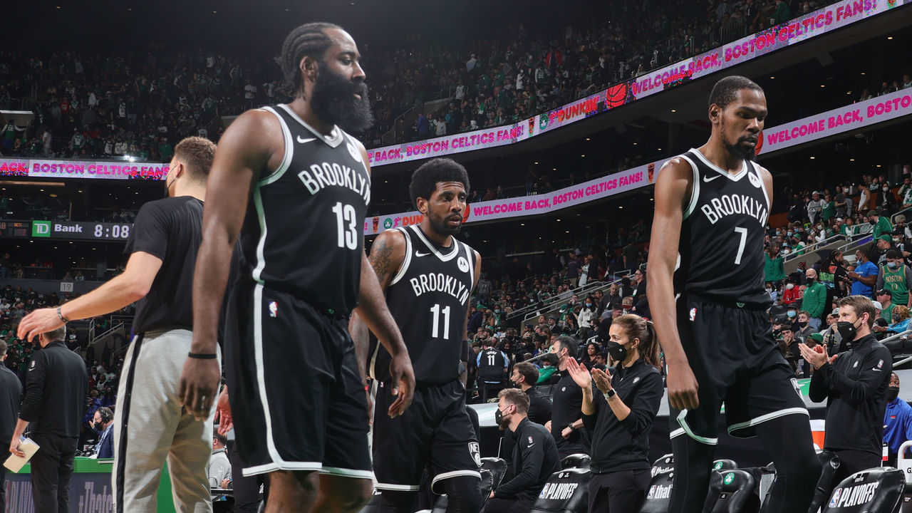 BOSTON, MA - MAY 30: James Harden #13, Kyrie Irving #11 and Kevin Durant #7 of the Brooklyn Nets walk off the court at halftime during Round 1, Game 4 of the 2021 NBA Playoffs on May 30, 2021 at the TD Garden in Boston, Massachusetts. Mandatory Copyright Notice: Copyright 2021 NBAE