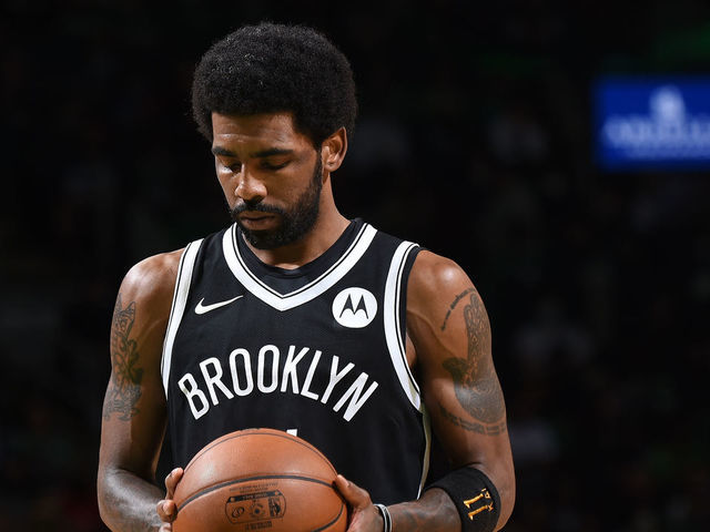 BOSTON, MA - MAY 30: Kyrie Irving #11 of the Brooklyn Nets looks on against the Boston Celtics during Round 1, Game 4 of the 2021 NBA Playoffs on May 30, 2021 at the TD Garden in Boston, Massachusetts. Mandatory Copyright Notice: Copyright 2021 NBAE