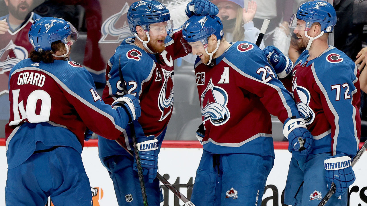 DENVER, COLORADO - MAY 30: Nathan MacKinnon #29 of Colorado Avalanche celebrates with Samuel Girard #49, Gabriel Landeskog #92 and Joonas Donskoi #72 after scoring against the Vegas Golden Knights during the second period in Game One of the Second Round of the 2021 Stanley Cup Playoffs at Ball Arena on May 30, 2021 in Denver, Colorado.
