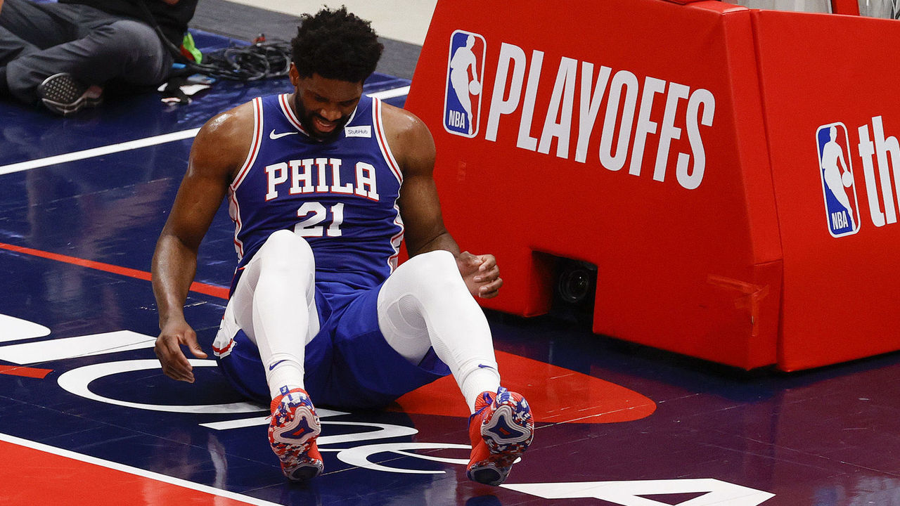 WASHINGTON, DC - MAY 31: Joel Embiid #21 of the Philadelphia 76ers lies on the floor during the first quarter against the Washington Wizards during Game Four of the Eastern Conference first round series at Capital One Arena on May 31, 2021 in Washington, DC.