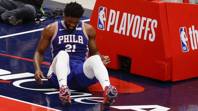 WASHINGTON, DC - MAY 31: Joel Embiid #21 of the Philadelphia 76ers lies on the floor during the first quarter against the Washington Wizards during Game Four of the Eastern Conference first round series at Capital One Arena on May 31, 2021 in Washington, DC.