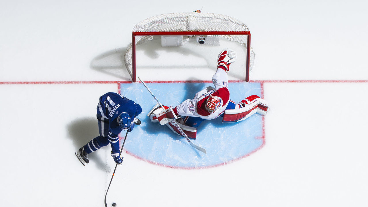 TORONTO, ON - MAY 31: Zach Hyman #11 of the Toronto Maple Leafs goes to the net abasing Carey Price #31 of the Montreal Canadiens during the third period in Game Seven of the First Round of the 2021 Stanley Cup Playoffs at the Scotiabank Arena on May 31, 2021 in Toronto, Ontario, Canada.