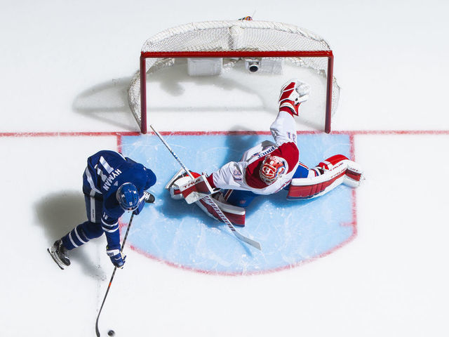 TORONTO, ON - MAY 31: Zach Hyman #11 of the Toronto Maple Leafs goes to the net abasing Carey Price #31 of the Montreal Canadiens during the third period in Game Seven of the First Round of the 2021 Stanley Cup Playoffs at the Scotiabank Arena on May 31, 2021 in Toronto, Ontario, Canada.