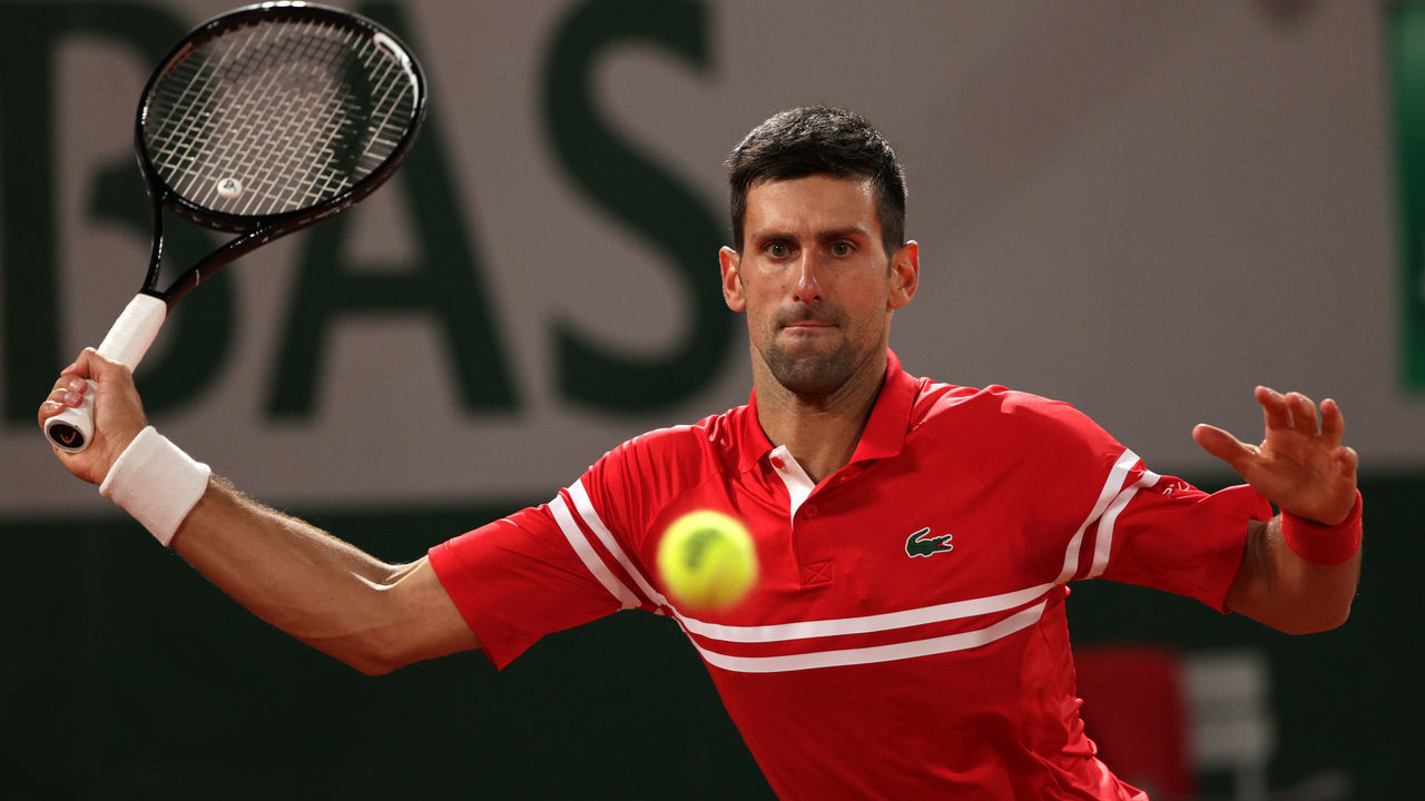 PARIS, FRANCE - JUNE 01: Novak Djokovic of Serbia plays a forehand in their mens first round match against Tennys Sandgren of The United States during day three of the 2021 French Open at Roland Garros on June 01, 2021 in Paris, France.