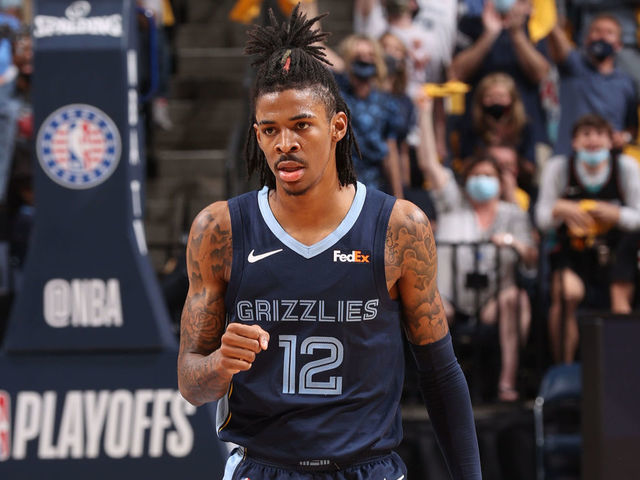 MEMPHIS, TN - MAY 31: Ja Morant #12 of the Memphis Grizzlies celebrates during the game against the Utah Jazz during Round 1, Game 4 of the 2021 NBA Playoffs on May 31, 2021 at FedExForum in Memphis, Tennessee. Mandatory Copyright Notice: Copyright 2021 NBAE