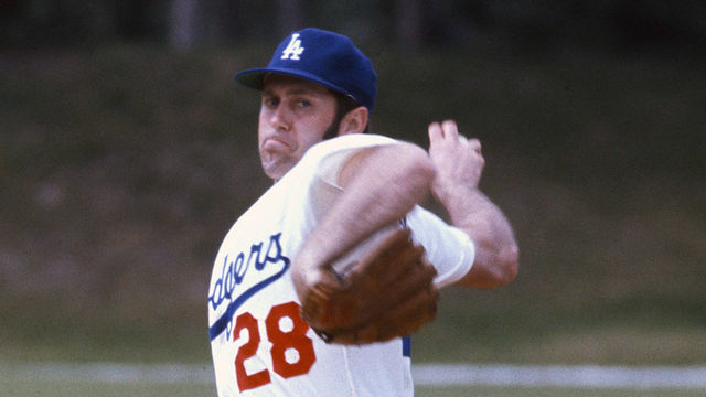 VERO BEACH, FL - CIRCA 1974: Mike Marshall #28 of the Los Angeles Dodgers pitches during an Major League Baseball game circa 1974 in Vero Beach, Florida. Marshall played for the Dodgers from 1974-76.