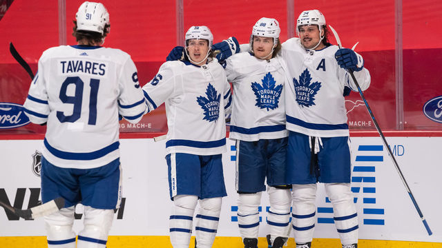 MONTREAL, QC - APRIL 28: William Nylander (88) of the Toronto Maple Leafs celebrates with Auston Matthews (34), Mitchell Marner (16) and John Tavares (91) after scoring the 1st goal of the first period of the NHL game between the Toronto Maple Leafs and the Montreal Canadiens on April 28, 2021, at the Bell Centre in Montreal, QC