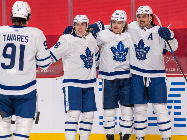 MONTREAL, QC - APRIL 28: William Nylander (88) of the Toronto Maple Leafs celebrates with Auston Matthews (34), Mitchell Marner (16) and John Tavares (91) after scoring the 1st goal of the first period of the NHL game between the Toronto Maple Leafs and the Montreal Canadiens on April 28, 2021, at the Bell Centre in Montreal, QC