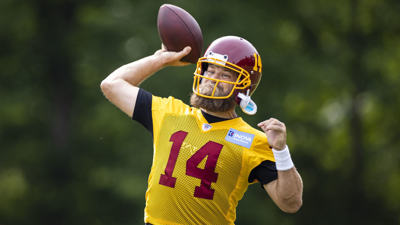 ASHBURN, VA - JUNE 02: Ryan Fitzpatrick #14 of the Washington Football Team throws during the organized team activity at Inova Sports Performance Center on June 2, 2021 in Ashburn, Virginia.