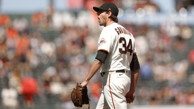 SAN FRANCISCO, CALIFORNIA - MAY 08: Kevin Gausman #34 of the San Francisco Giants reacts after he struck out Eric Hosmer #30 of the San Diego Padres in the sixth inning at Oracle Park on May 08, 2021 in San Francisco, California.