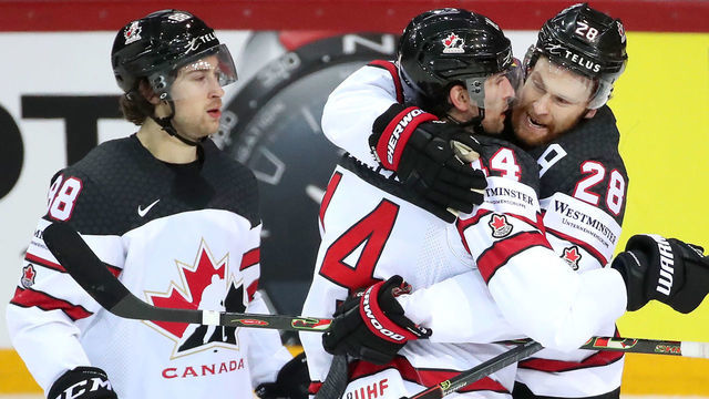 RIGA, LATVIA - JUNE 3, 2021: Canada's players celebrate a goal in a 2021 IIHF World Championship quarterfinal ice hockey match against Russia at the Olympic Sports Center. Due to CAS sanctions, the Russian team performs under the name and flag of the Russian Olympic Committee (ROC). Natalia Fedosenko/TASS