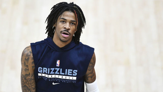 SALT LAKE CITY, UTAH - JUNE 02: Ja Morant #12 of the Memphis Grizzlies warms up before Game Five of the Western Conference first-round playoff series against the Utah Jazz at Vivint Smart Home Arena on June 2, 2021 in Salt Lake City, Utah. NOTE TO USER: User expressly acknowledges and agrees that, by downloading and/or using this photograph, user is consenting to the terms and conditions of the Getty Images License Agreement.