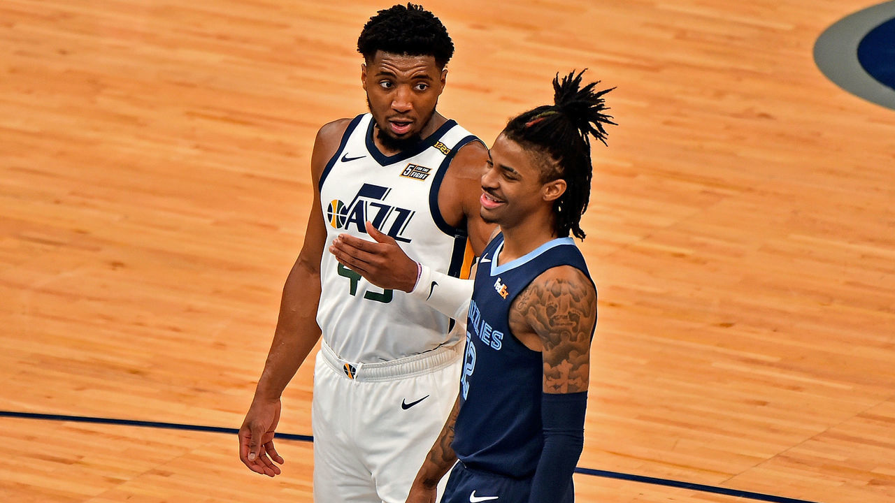MEMPHIS, TENNESSEE - MAY 31: Donovan Mitchell #45 of the Utah Jazz and Ja Morant #12 of the Memphis Grizzlies during Game Four of the Western Conference first round series on May 31, 2021 at FedExForum in Memphis, Tennessee.