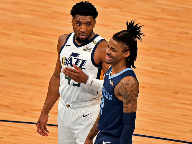 MEMPHIS, TENNESSEE - MAY 31: Donovan Mitchell #45 of the Utah Jazz and Ja Morant #12 of the Memphis Grizzlies during Game Four of the Western Conference first round series on May 31, 2021 at FedExForum in Memphis, Tennessee.