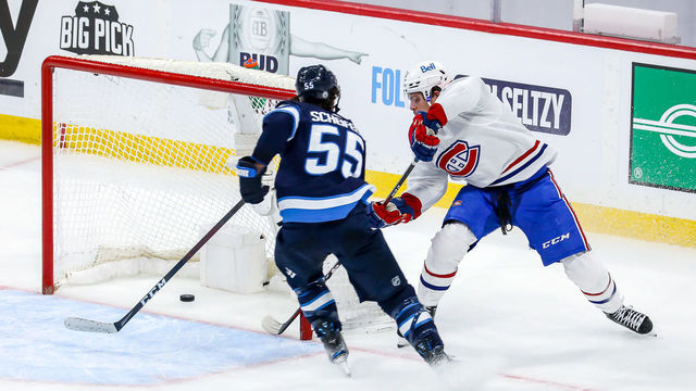 WINNIPEG, MB - JUNE 2: Jake Evans #71 of the Montreal Canadiens scores a third period empty net goal against the Winnipeg Jets in Game One of the Second Round of the 2021 Stanley Cup Playoffs at the Bell MTS Place on June 2, 2021 in Winnipeg, Manitoba, Canada.
