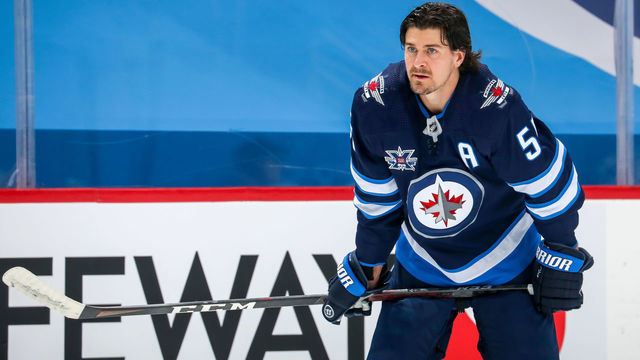 WINNIPEG, MB - MAY 14: Mark Scheifele #55 of the Winnipeg Jets looks on during the pre-game warm up prior to NHL action against the Toronto Maple Leafs at Bell MTS Place on May 14, 2021 in Winnipeg, Manitoba.