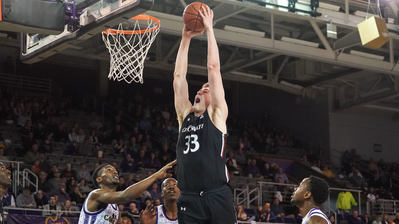 GREENVILLE, NC - FEBRUARY 16: Cincinnati Bearcats center Chris Vogt (33) dunks the ball during a game between the Cincinnati Bearcats and the East Carolina Pirates on February 16, 2020 Williams Arena at Minges Coliseum in Greenville, NC.