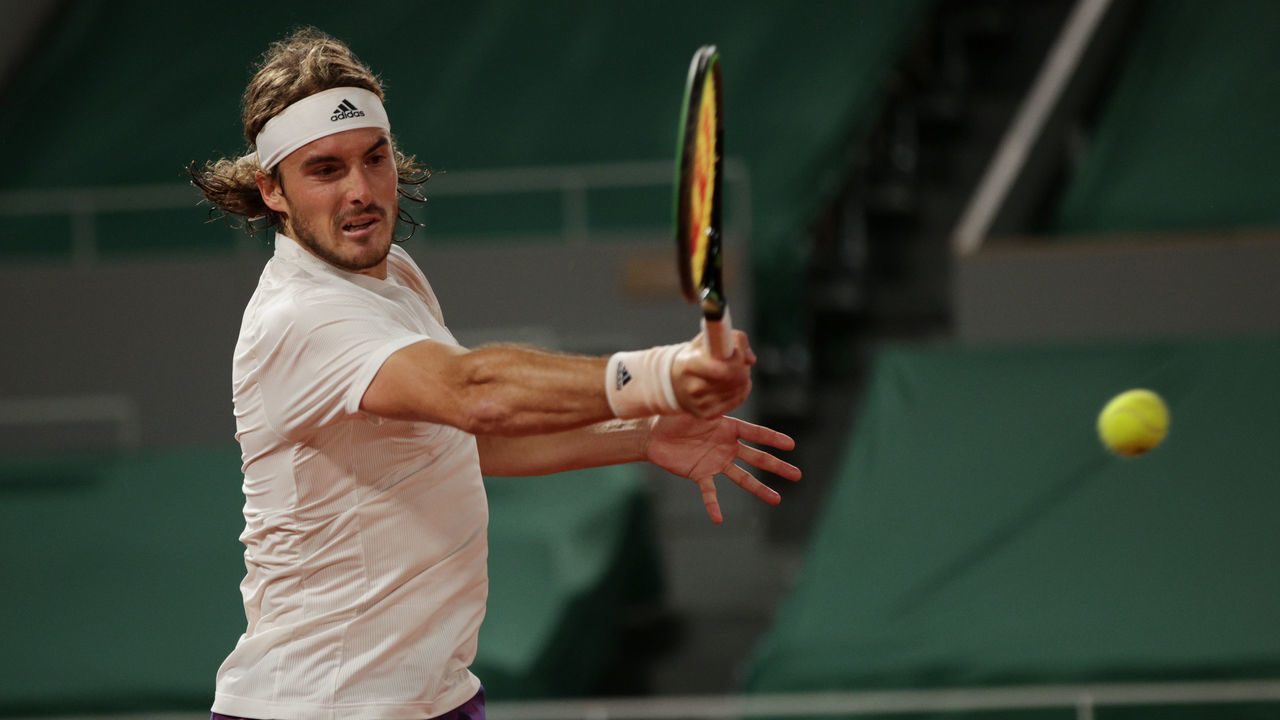 PARIS, FRANCE - JUNE 04: Stefanos Tsitsipas of Greece plays a forehand during his men's singles third round match against John Isner of USA on during day six of the 2021 French Open at Roland Garros on June 04, 2021 in Paris, France.