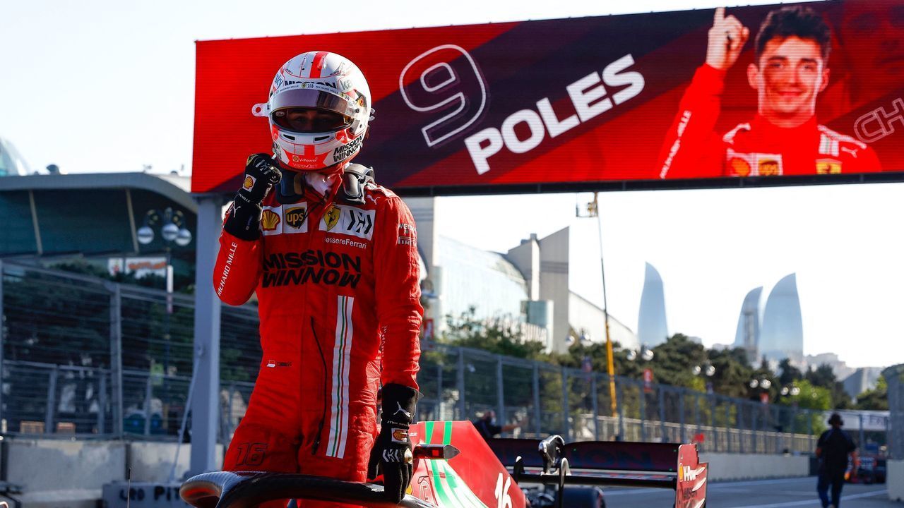 Ferrari's Monegasque driver Charles Leclerc celebrates after claiming pole position in the qualifying session for the Formula One Azerbaijan Grand Prix at the Baku City Circuit in Baku on June 5, 2021.