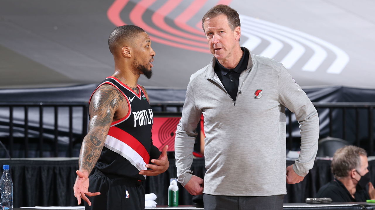 PORTLAND, OR - MAY 29: Damian Lillard #0 and Head Coach, Terry Stotts of the Portland Trail Blazers share a conversation during the game against the Denver Nuggets during Round 1, Game 4 of the 2021 NBA Playoffs on May 29, 2021 at the Moda Center Arena in Portland, Oregon. Mandatory Copyright Notice: Copyright 2021 NBAE