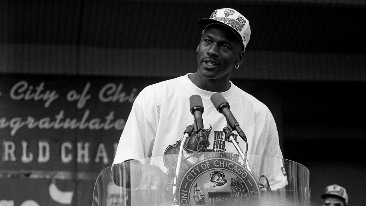 CHICAGO - JUNE 1996: Former Chicago Bulls guard Michael Jordan addresses the crowd during a celebration of the Chicago Bulls' 4th N.B.A. Championship at the Petrillo Music Shell in Chicago, Illinois in June1996.