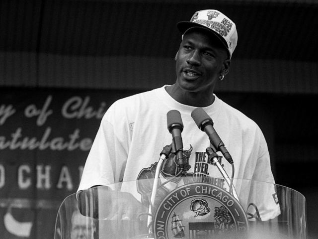CHICAGO - JUNE 1996: Former Chicago Bulls guard Michael Jordan addresses the crowd during a celebration of the Chicago Bulls' 4th N.B.A. Championship at the Petrillo Music Shell in Chicago, Illinois in June1996.