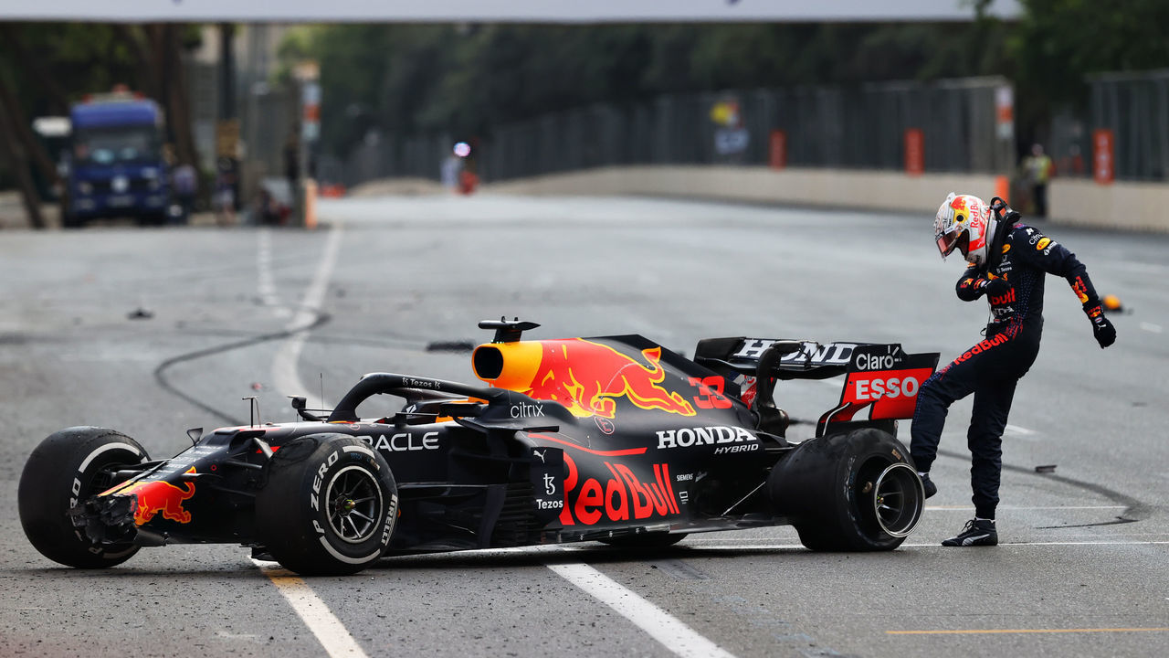 BAKU, AZERBAIJAN - JUNE 06:Max Verstappen of Netherlands and Red Bull Racing kicks his tyre as he reacts after crashing during the F1 Grand Prix of Azerbaijan at Baku City Circuit on June 06, 2021 in Baku, Azerbaijan.