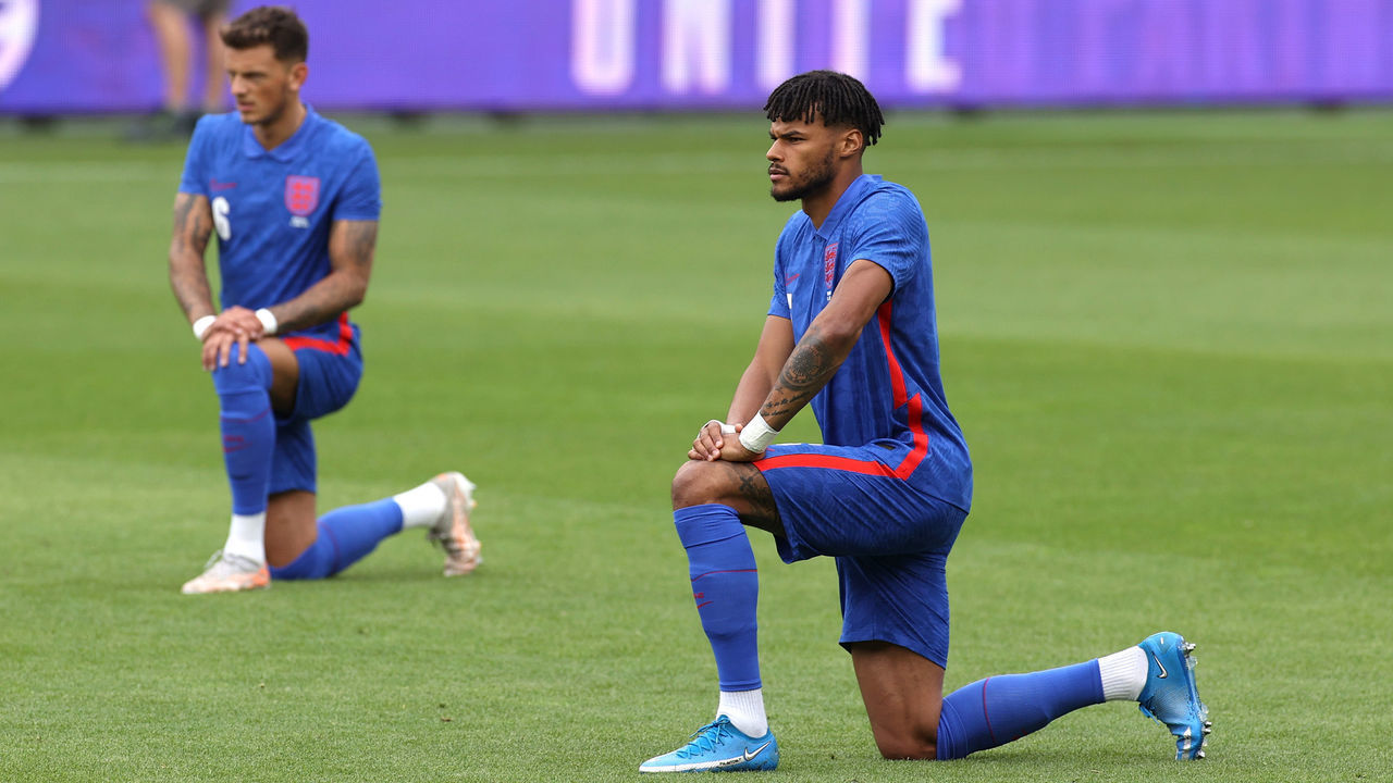 MIDDLESBROUGH, ENGLAND - JUNE 06: Tyrone Mings of England takes a knee in support of the Black Lives Matter movement prior to the international friendly match between England and Romania at Riverside Stadium on June 06, 2021 in Middlesbrough, England.