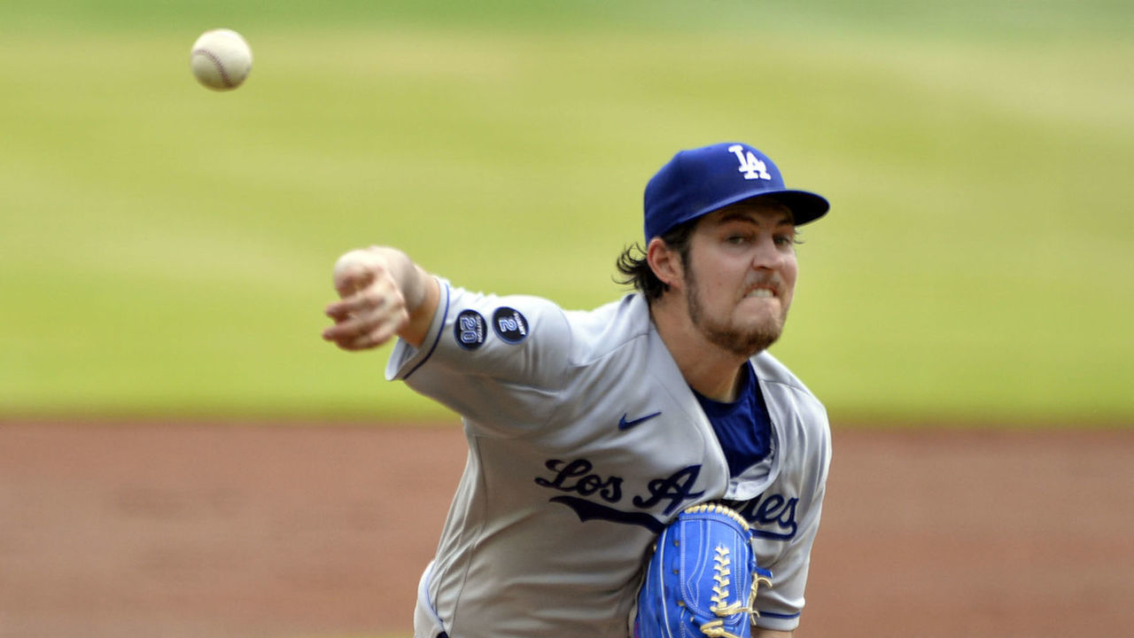 ATLANTA, GA - JUNE 06: Trevor Bauer #27 of the Los Angeles Dodgers pitches against the Atlanta Braves in the first inning at Truist Park on June 6, 2021 in Atlanta, Georgia.
