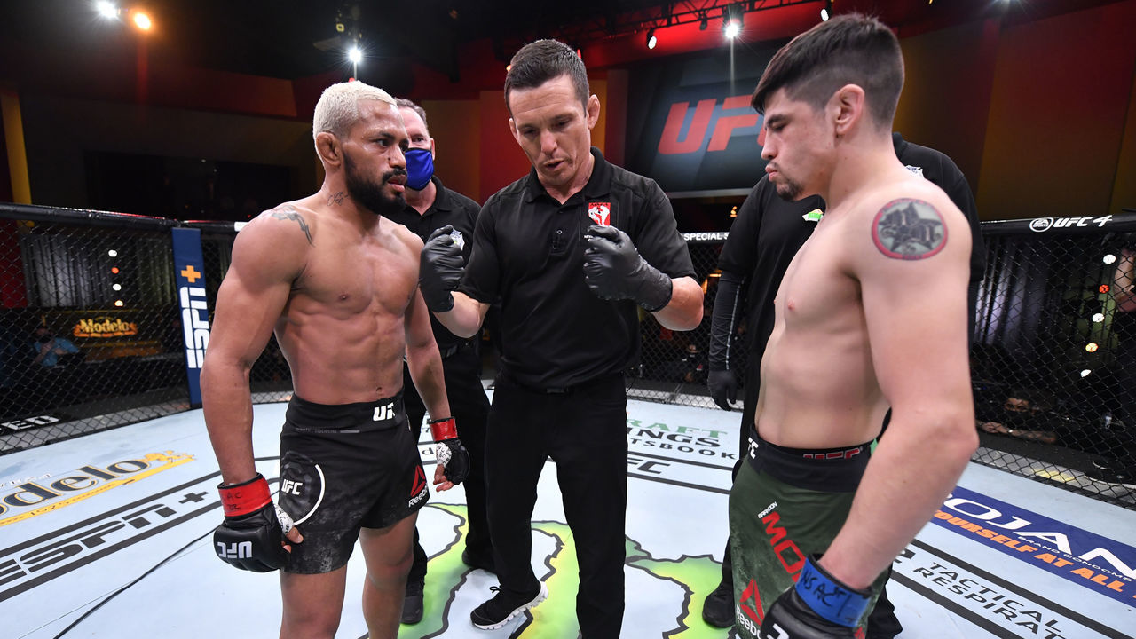 LAS VEGAS, NEVADA - DECEMBER 12: (L-R) Deiveson Figueiredo of Brazil and Brandon Moreno of Mexico face off prior to their flyweight championship bout during the UFC 256 event at UFC APEX on December 12, 2020 in Las Vegas, Nevada.