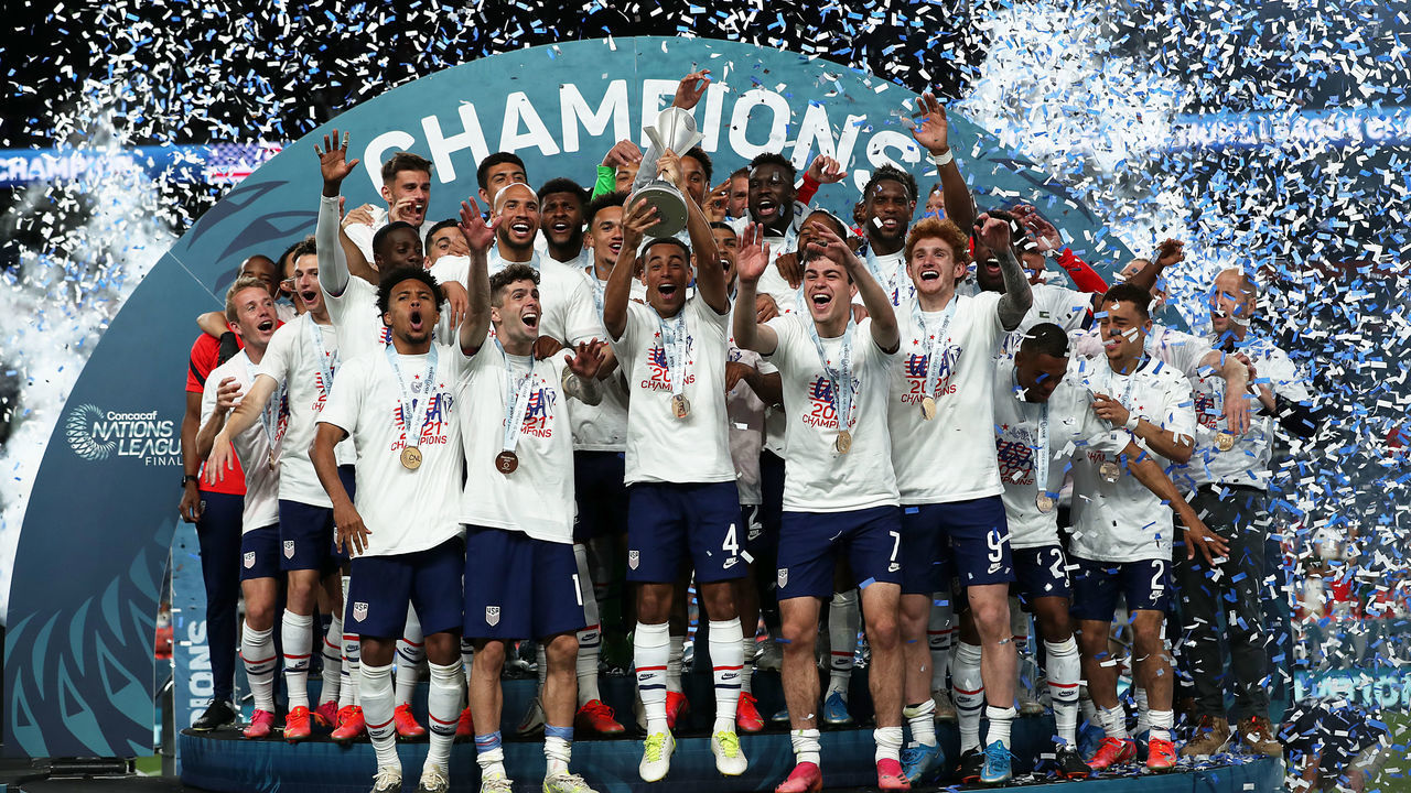 DENVER, CO - JUNE 06: Players of United States lift the trophy after wining the CONCACAF Nations League Championship Final between United States and Mexico at Empower Field At Mile High on June 6, 2021 in Denver, Colorado.